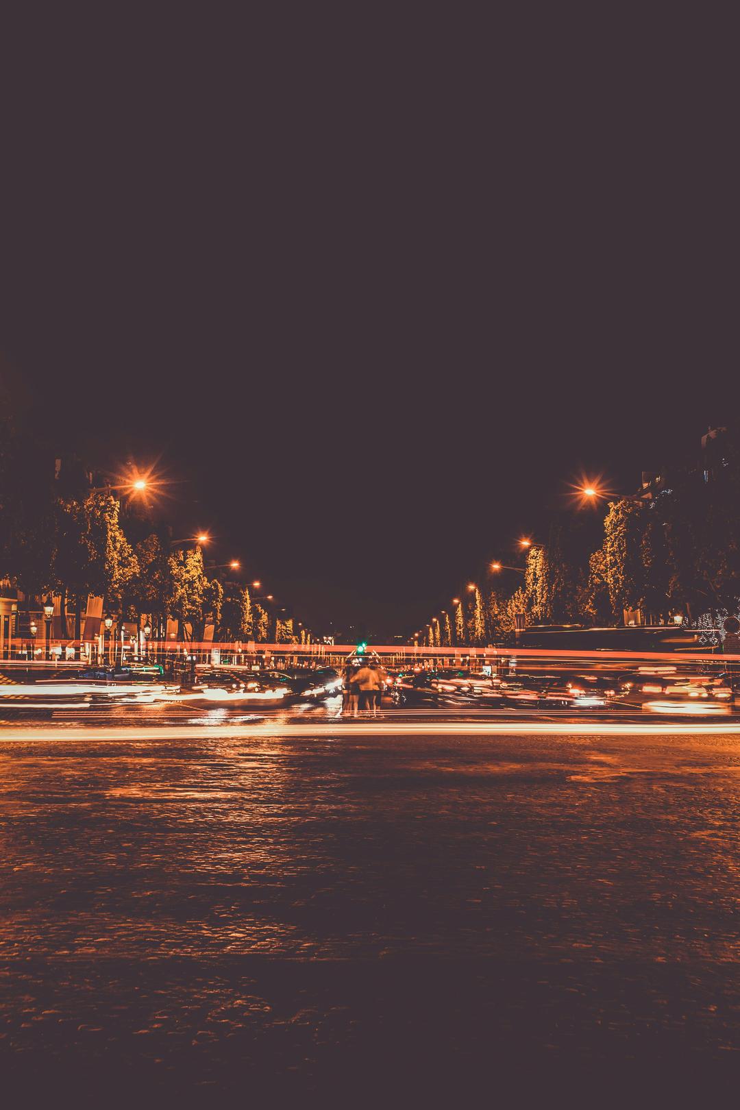 A beautiful view of a city with street lights at night